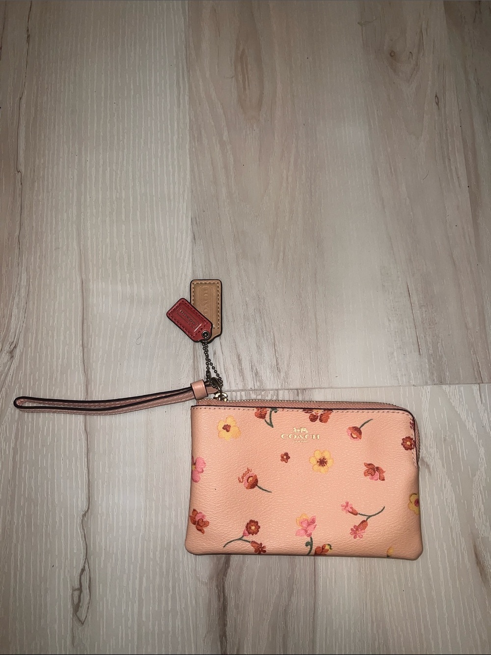 Coach Peach Floral Wristlet Pouch with Strap like new
